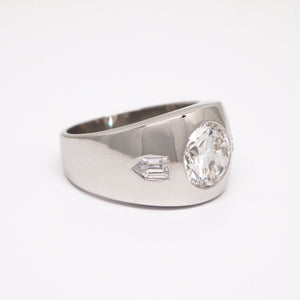 Custom designed men's ring using a family diamond.