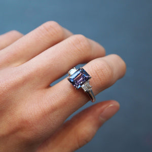 platinum ring featuring a color change blue lavender spinel and diamonds